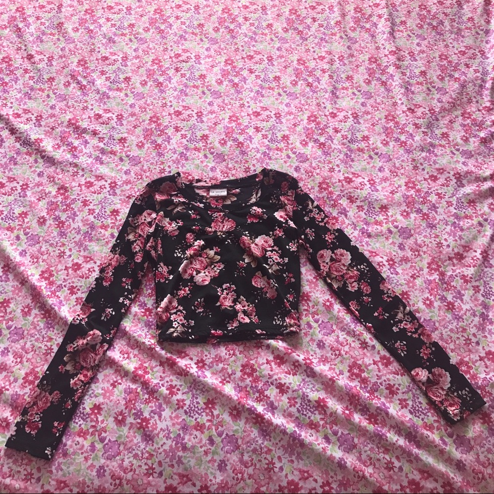 black long sleeve crop top with a flower print